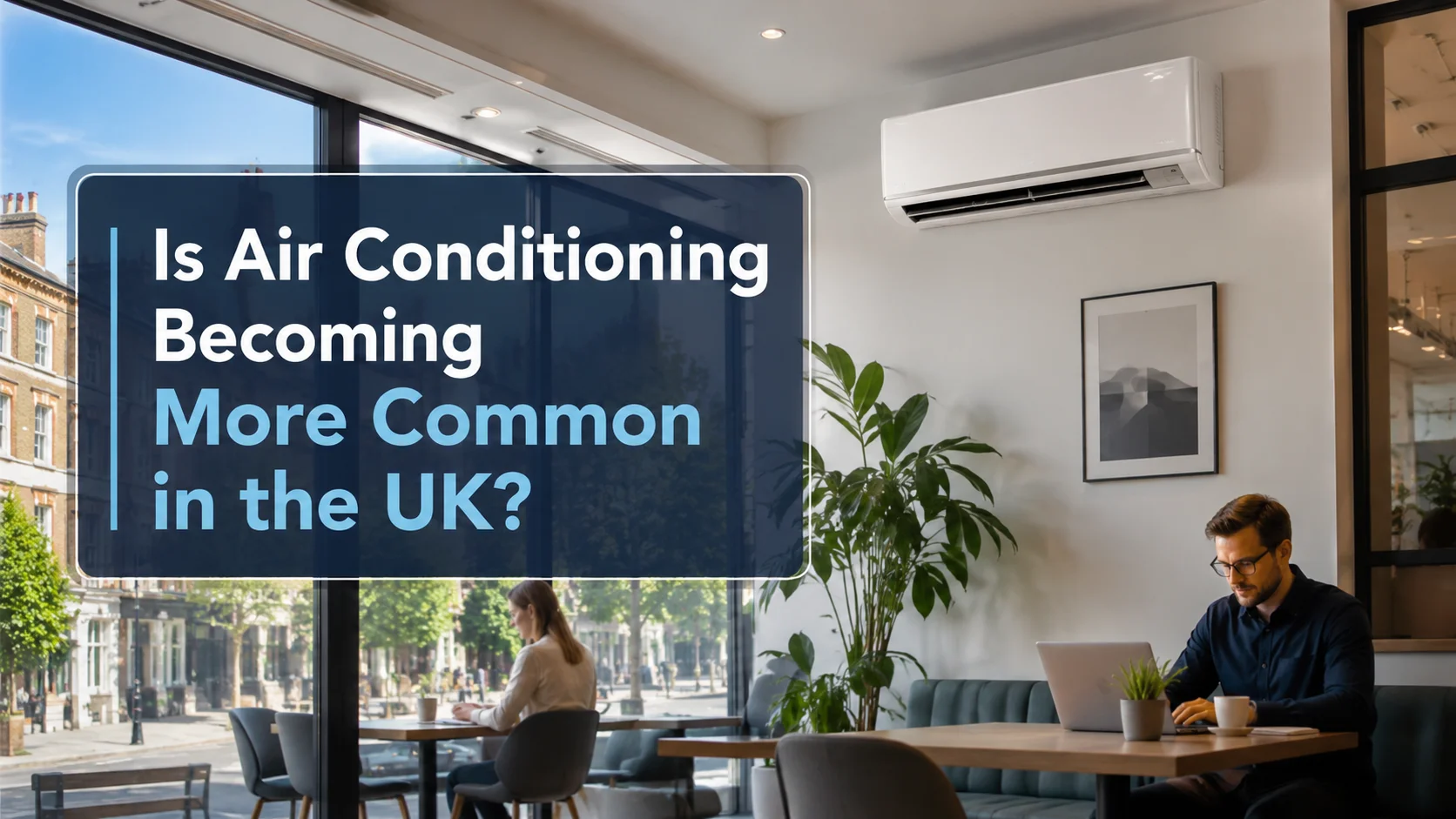 Modern UK workspace with a wall mounted air conditioning unit, showing how air conditioning is becoming more common in homes and businesses.
