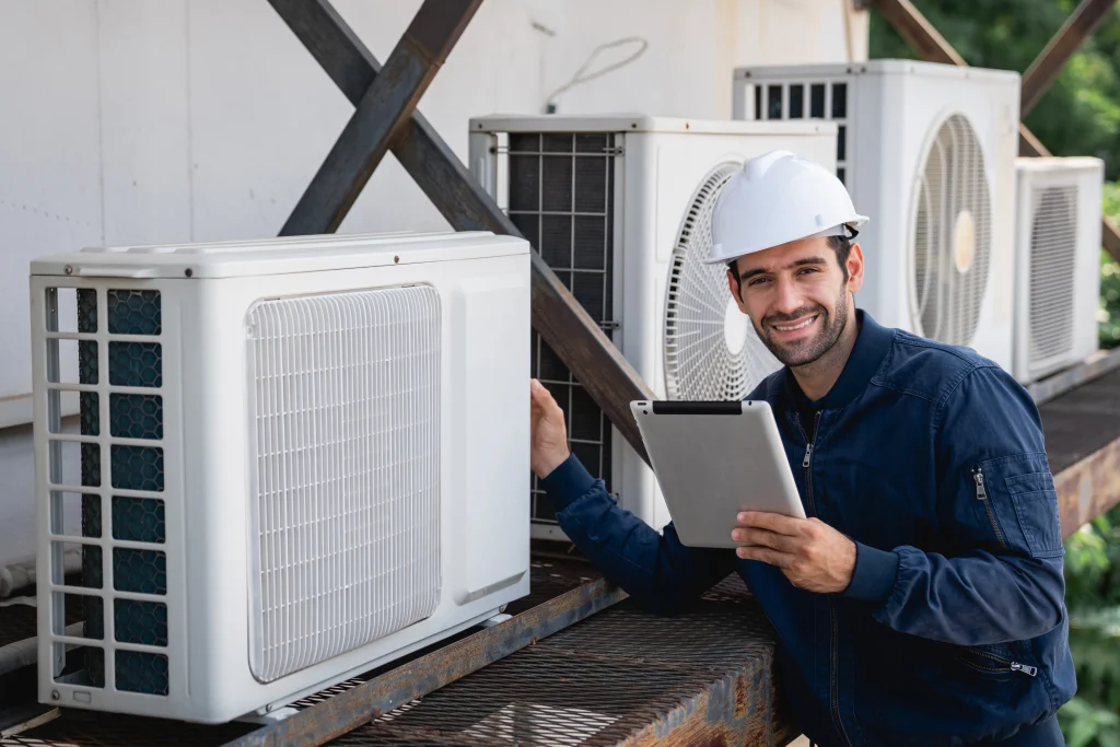 commercial air conditioning engineer reviewing a recent commercial ac installation